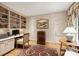 Cozy home office space featuring built-in shelving and a bright, comfortable workspace at 2126 Norton Rd, Charlotte, NC 28207