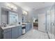 Spa-like bathroom with double vanity, soaking tub, and a separate glass shower at 2625 Rea Pond Ct, Charlotte, NC 28226