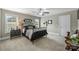 Bedroom with metal bed frame, black and white bedding, and a chest of drawers beside the bed at 2625 Rea Pond Ct, Charlotte, NC 28226