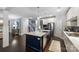 Bright, modern kitchen with stainless appliances and dark hardwood floors at 2625 Rea Pond Ct, Charlotte, NC 28226