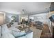 Open concept living spaces with a living room, kitchen, and dining room at 2625 Rea Pond Ct, Charlotte, NC 28226
