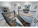 Elegant staircase with dark wood railing and white risers leads to the upper level at 2625 Rea Pond Ct, Charlotte, NC 28226