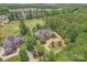 An aerial view of an estate on the golf course at 277 Tradition Dr, Mount Gilead, NC 27306