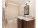 Bathroom with brown cabinets, neutral countertops, and a shower with a glass door at 277 Tradition Dr, Mount Gilead, NC 27306