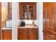 Butlers pantry with cabinetry, stone countertop, and coffee machine at 277 Tradition Dr, Mount Gilead, NC 27306