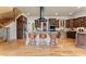 Gourmet kitchen with custom cabinets, stainless steel appliances, and a breakfast bar with seating at 277 Tradition Dr, Mount Gilead, NC 27306