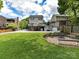 Expansive backyard with deck, fire pit, patio, and ample space for outdoor enjoyment at 2804 Park Rd, Charlotte, NC 28209