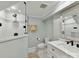 Modern bathroom featuring a glass-enclosed shower with white tile and stylish vanity at 2804 Park Rd, Charlotte, NC 28209