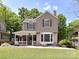 Charming two-story home boasts a well-maintained lawn and inviting front porch at 2804 Park Rd, Charlotte, NC 28209