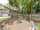 Backyard fire pit with seating, perfect for outdoor gatherings and enjoying cozy evenings at 2804 Park Rd, Charlotte, NC 28209