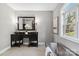 Elegant bathroom featuring double sink vanity with dark wood cabinets and decorative mirrors at 2817 Lakefront Dr, Belmont, NC 28012
