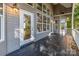 Spacious deck features sleek design with multiple windows, offering natural light and an outdoor living space at 2817 Lakefront Dr, Belmont, NC 28012