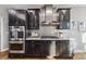 Gourmet kitchen with stainless steel appliances, custom cabinets, and modern backsplash at 2817 Lakefront Dr, Belmont, NC 28012