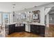 Kitchen with stainless appliances, island sink, granite counters and many windows at 2817 Lakefront Dr, Belmont, NC 28012