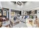 Open concept living room with hardwood floors, gray walls and black kitchen cabinets at 2817 Lakefront Dr, Belmont, NC 28012