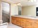 Bathroom featuring a glass shower and vanity at 2818 Cherry Ln, Denver, NC 28037