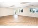 Bonus room features hardwood floors, windows, and a sliding glass door at 2818 Cherry Ln, Denver, NC 28037
