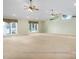 Spacious living room with vaulted ceiling and multiple windows with lake views at 2818 Cherry Ln, Denver, NC 28037