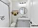 Cozy bathroom with decorative accents and a shower with curtain at 4015 Pritchard Pl, Fort Mill, SC 29715