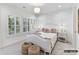 Serene bedroom with plush bedding, and neutral decor at 4015 Pritchard Pl, Fort Mill, SC 29715