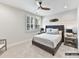 Tranquil bedroom with natural light, a comfortable bed, and stylish decor at 4015 Pritchard Pl, Fort Mill, SC 29715