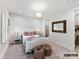 Charming bedroom featuring a decorative bedframe, soft textures, and ample lighting at 4015 Pritchard Pl, Fort Mill, SC 29715
