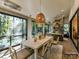 Enclosed patio with a dining table, outdoor seating, and a fireplace at 4015 Pritchard Pl, Fort Mill, SC 29715