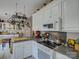 Bright kitchen boasts updated appliances, countertops, and white cabinets at 433 Linsbury Ct, Gastonia, NC 28056