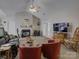 Spacious living room featuring a fireplace, comfortable seating, and ample natural light, ideal for relaxation at 433 Linsbury Ct, Gastonia, NC 28056