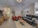 Cozy living room with comfortable seating, stylish decor, and ample space for entertaining guests at 433 Linsbury Ct, Gastonia, NC 28056