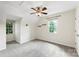Bedroom with plush carpeting, ceiling fan, and natural light at 540 Garrison Sw Ct, Concord, NC 28025