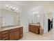 Beautiful bathroom with double sinks, granite countertops, a separate shower, and access to a walk-in closet at 5422 Shannon Bell Ln, Charlotte, NC 28277