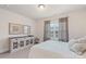Bedroom showcasing large dresser, neutral walls, carpet, and natural light at 5422 Shannon Bell Ln, Charlotte, NC 28277