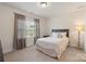 Bedroom with neutral walls, carpet, and natural light from window at 5422 Shannon Bell Ln, Charlotte, NC 28277