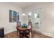 Cozy breakfast nook featuring a round table and chairs, adjacent to sliding patio doors at 5422 Shannon Bell Ln, Charlotte, NC 28277