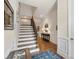 Elegant entryway with staircase, wood floors, mirror, and console table at 5422 Shannon Bell Ln, Charlotte, NC 28277