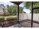 Relaxing screened porch with bench and overhead coverage perfect for enjoying outdoors at 5422 Shannon Bell Ln, Charlotte, NC 28277