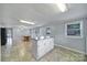 Large kitchen area with eat in island, dining area, and lots of natural light at 5573 Main St, Fort Lawn, SC 29714