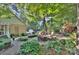 Beautiful backyard with a fire pit and wooded views that provide the perfect peaceful retreat at 6005 Bryant Ln, Waxhaw, NC 28173
