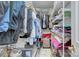 Walk-in closet with plenty of storage space, shelves, and rods for organizing clothes at 6005 Bryant Ln, Waxhaw, NC 28173