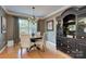Elegant dining room featuring hardwood floors, chandelier, and classic wood accents at 6005 Bryant Ln, Waxhaw, NC 28173