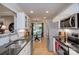 Modern kitchen featuring stainless steel appliances, granite countertops, and an open layout at 6005 Bryant Ln, Waxhaw, NC 28173