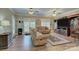 Spacious living room with comfortable seating, entertainment center, and a cozy fireplace at 6005 Bryant Ln, Waxhaw, NC 28173
