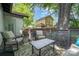 Inviting back deck with seating for two, perfect for relaxation and enjoying the outdoors at 624 Oakland Ave, Charlotte, NC 28204