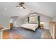 Attic bedroom with high ceilings, wood floors, two closets and natural light at 624 Oakland Ave, Charlotte, NC 28204