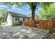 Spacious driveway and fenced backyard, ideal for outdoor entertaining and privacy at 624 Oakland Ave, Charlotte, NC 28204