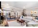 Inviting living room with modern furniture, connecting the kitchen and dining area for seamless entertaining at 624 Oakland Ave, Charlotte, NC 28204