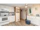 Functional kitchen featuring white cabinets, modern appliances, and plenty of counter space at 6804 Lineberger Rd, Denver, NC 28037