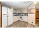 Bright kitchen with white cabinets and appliances offers a clean and functional space at 6804 Lineberger Rd, Denver, NC 28037
