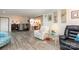 A bright, open living room with modern flooring and ample seating, perfect for gatherings at 6804 Lineberger Rd, Denver, NC 28037